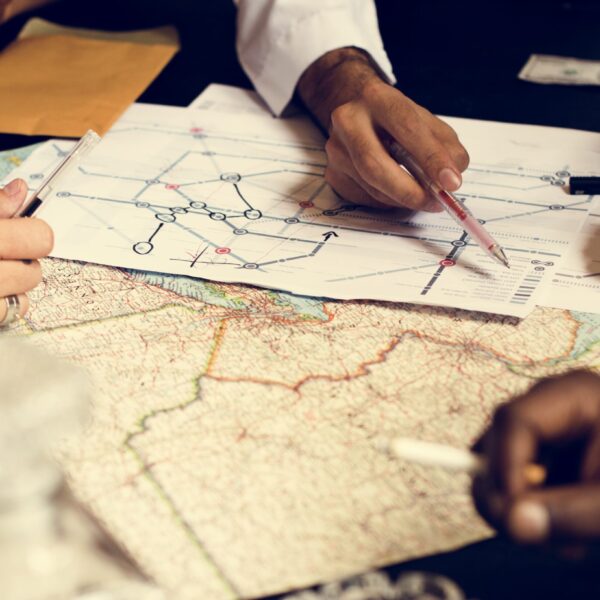 Group of people planning with the map